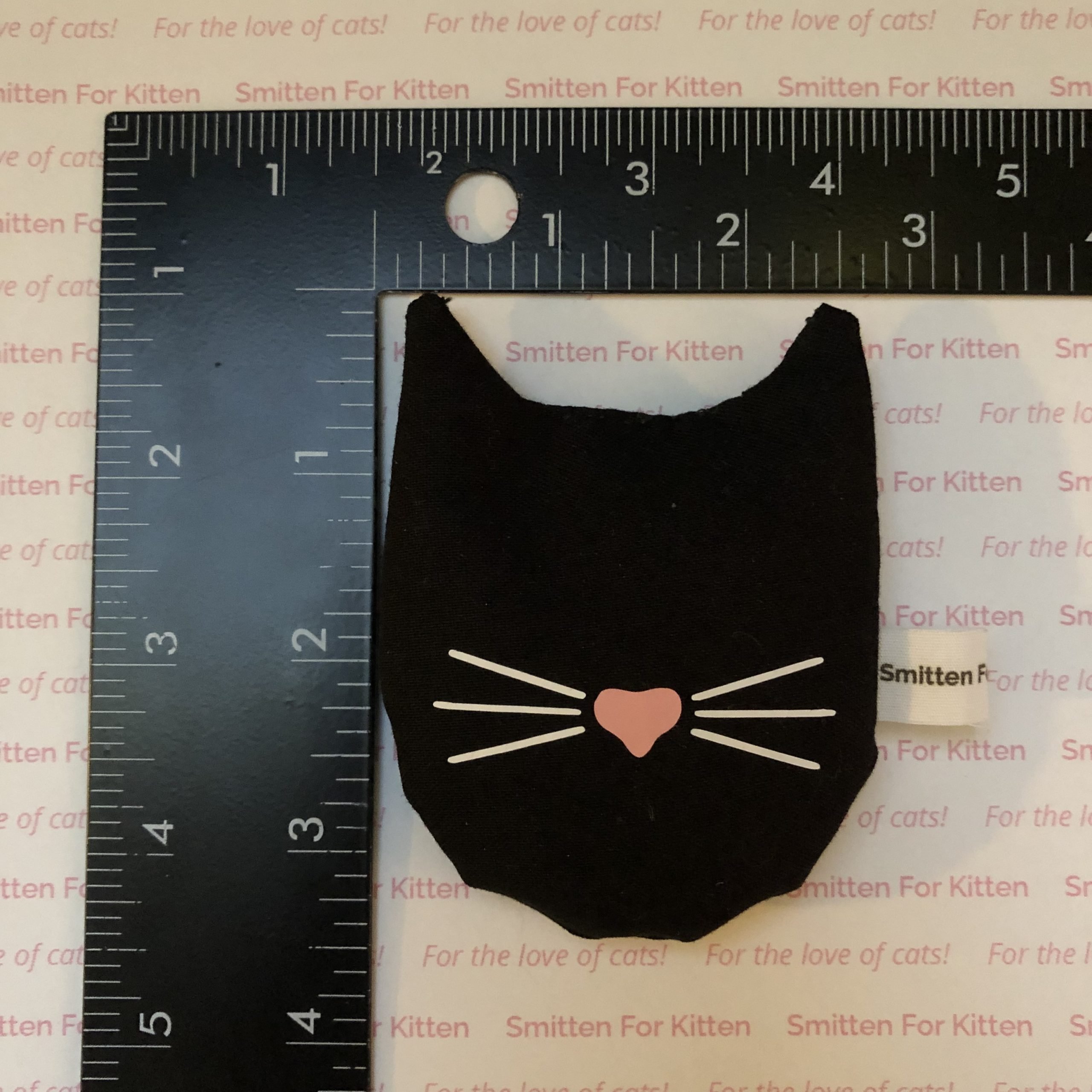 Mister Whiskers cat head toy