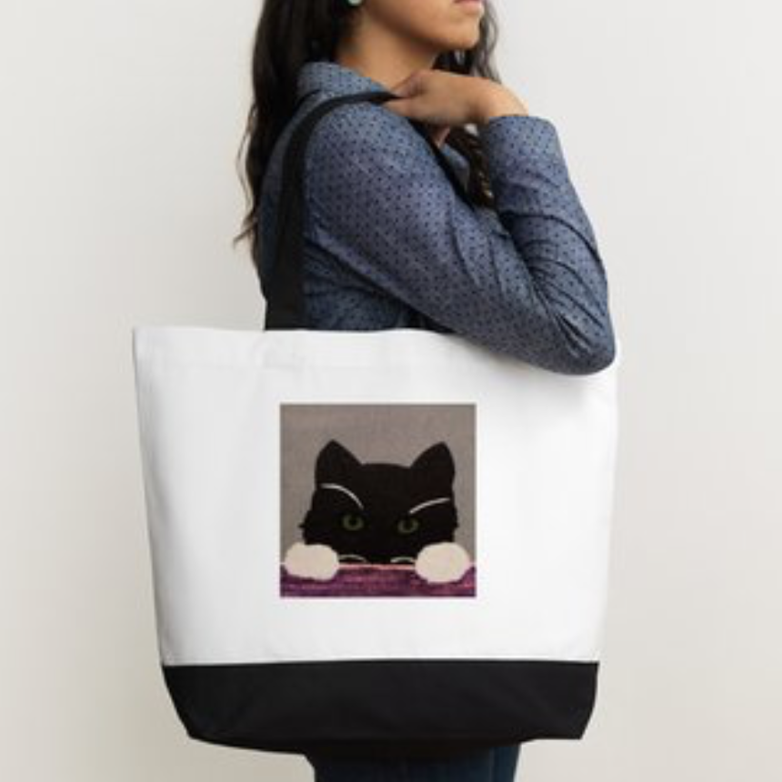 Cat Out of the Bag tote Merlin Mischief display